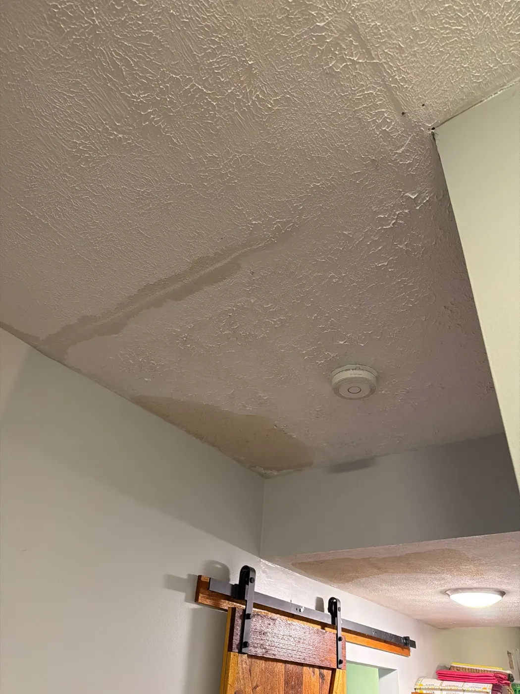 Moisture meter reading on drywall in Indian Creek Estates water loss